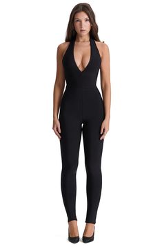 Signature boning and corsetry defines this structured jumpsuit crafted of the brand's classic stretch-bandage fabric and topped by a flirty neckline. Exclusive retailer Plunge neck Unlined 90% viscose, 9% nylon, 1% elastane Dry clean Imported Structured Jumpsuit, Plunge Corset, Dance Fits, Miami Bachelorette, Black Catsuit, Bandage Jumpsuits, Taurus Moon, Jumpsuit Outfit, Female Figure