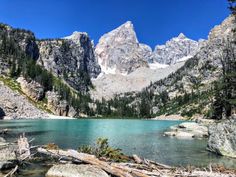 a mountain lake surrounded by trees and rocks