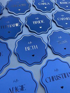 blue wedding place cards with names on them