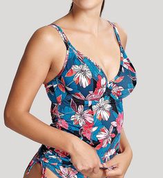 Get more than a splash of color with this fun, supportive abstract floral swim tankini. Made of polyamide and elastane. Built-in shelf bra has multipart underwire cups with vertical seams for shape and fine mesh lining for comfort and support. Bra-sized options make it easy to find the perfect size! Sewn-on elastic underband has a soft texture and helps cup bottoms stay in place. Deep V-neckline has covered elastic binding to hold fit close. Shelf bra extensions line top sides/back with supporti Multicolor Bra-friendly Tankini For Pool, Blue Tankini With Padded Cups For Summer, Blue Beachwear Tankini With Padded Cups, Blue Padded Tankini For Swimming, Blue Fitted Tankini With Padded Cups, Fitted Blue Tankini With Padded Cups, Support Bra, Tankini Swim Tops, Swim Tankini