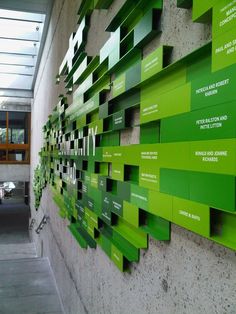 a wall that has some green boxes on it