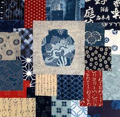 a patchwork quilt with many different designs on it