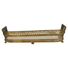 an ornate brass tray with handles