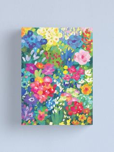 colorful flowers on a blue background canvas print