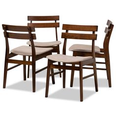 a set of four wooden chairs with upholstered backrests and seat cushions