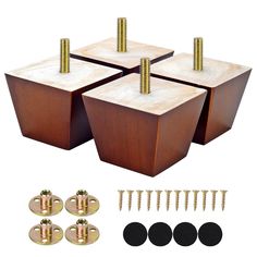 four wooden boxes with screws and nails on the top one has two sets of screws