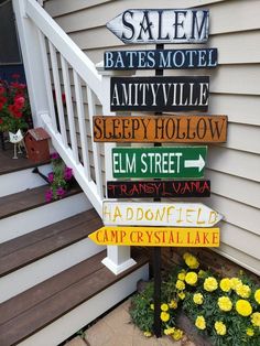 a sign that is on the side of a house saying salem hates motel amityville sleepy hollow elm street