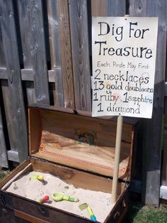 an open trunk with a sign on it that says dig for treasure