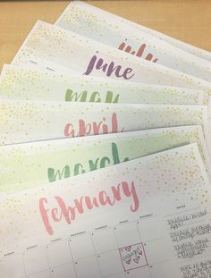 five calendars with the words june and january written in pink, green, yellow and purple ink