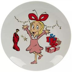 a white plate with a cartoon girl holding a red umbrella and gift boxes on it