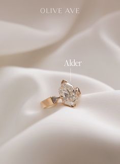 14K Yellow Gold | Alder features a beautiful duchess center stone set with v-prongs accented by triangle side stones on a thick shank. Ring Stack, Wedding Aesthetic, Shiny Things, Jewelry Companies, Perfect Ring, Lab Diamonds, Stone Settings, High Quality Jewelry, Gold Accents