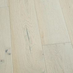 an image of white wood flooring that looks like it has been cleaned and polished