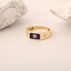 Unveil the celestial elegance of the Polaris Ring, where three North Stars meet a stunning blend of gold and blue hues, guiding your style with timeless grace.  Crafted from 14K Gold Vermeil, this ring captures the essence of the North Star, symbolizing direction, hope, and inspiration. The Polaris, known for its unwavering position in the night sky, has long been a symbol of finding one's true path.  This ring brings that guiding light to your collection, connecting you to the universe's vast b The North Star, Guiding Light, Gold And Blue, Enamel Ring, Star Ring, One Ring, North Star, Blue Tones, Blue Hues