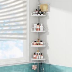 a white shelf in the corner of a bathroom next to a bath tub and window