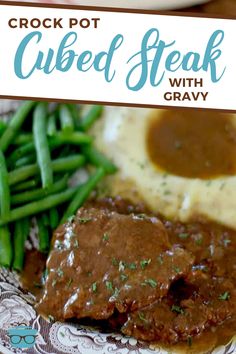 crock pot cubed steak with gravy on a plate