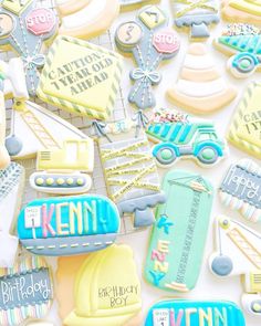 decorated cookies are displayed on a table for someone's 50th birthday party or celebration