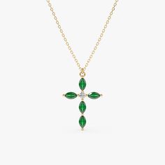 Unleash your style with our exquisite jewelry collection! 💎✨ Click the link to explore a variety of stunning pieces that will transform any outfit. From elegant necklaces to eye-catching earrings, find the perfect accessory to express your unique personality. Don’t wait—discover your new favorite jewelry today! 😄😌😋 Cross Green Necklace, Elegant Green Cross Pendant Necklace, Elegant Green Cross Necklace, Emerald Cross, Memory Ring, Meaningful Design, Natural Gemstone Necklace, Unique Pendant Necklace, Gold Cross Necklace