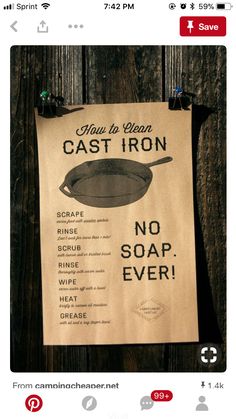 a sign on a wooden fence that says how to clean cast iron no soap ever