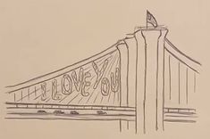 a drawing of a bridge with the word love you written on it's side