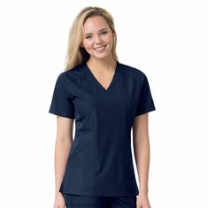 A practical v-neck scrub top built for movementStay connected and ready for the demands of your shift in this women's V-neck scrub top. The polyester blend is built for mobility and stain resistance to keep you clean and presentable all shift longFeatures90% Polyester / 10% SpandexFast Dry® technology wicks away sweatStain Breaker® technology releases stainsBuilt to move with Rugged Flex® stretch technologyBungee ID loop at shoulderPrincess seaming for tailored fitFour lower front pockets with p Carhartt Scrubs, Leg Scrub, Plus Size Workwear, Womens Scrub Tops, Carhartt Womens, Carhartt Women, Womens Scrubs, Medical Scrubs, Stretch Top