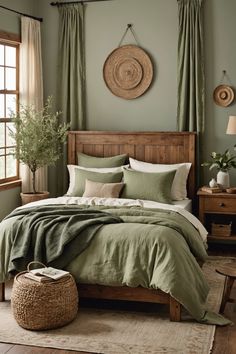 a bed with green sheets and pillows in a bedroom