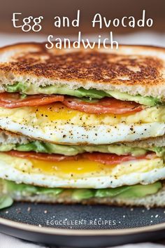 an egg and avocado sandwich is stacked on top of each other with the words, egg and avocado sandwich