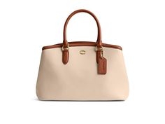 COACH Legacy Carryall 28 in Color Block - Tote Handbags : Ivory Multi : Please Note: COACH items cannot be shipped to military addresses (APO or FPO) and addresses in Hawaii, the Virgin Islands, Guam or any other locations outside of the continental US. Timeless style is the main feature of the COACH Legacy Carryall28 in Color Block. The double handles are accented with a removeable and adjustable shoulder strap, branded hardware and tag, and magnetic snap closure. The interior features two open compartments, branded patch, and single zipper pocket. Made with leather and lined with polyester. Imported. Measurements: Bottom Width: 12 1 4 in Depth: 5 3 4 in Height: 8 in Strap Drop: 21 1 2 in Handle Drop: 4 1 4 in Coach Legacy, Color Block Tote, Back Bag, Coach Handbags, Brand Sale, Zipper Pocket, Tote Handbags, Bags Handbags, Bones