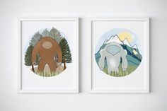 two framed art prints depicting animals in the woods, one with a bear and another with a monkey