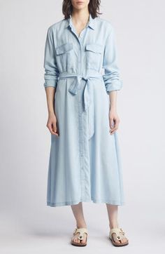 Timeless polish meets ultimate comfort in a button-front midi shirtdress cinched with a matching belt and cut from fresh, lightweight chambray. 47" length (size medium) Front button closure Spread collar Long sleeves with button cuffs Chest flap-patch pockets; side-seam pockets 100% Tencel® lyocell Tencel lyocell is a more-sustainably produced fiber made with closed-loop processing Machine wash, line dry Imported Casual Fitted Belted Dress For Spring, Casual Button-up Maxi Dress With Pockets, Spring Collared Shirt Dress With Roll-up Sleeves, Relaxed Fit Maxi Shirt Dress For Daywear, Spring Daywear Relaxed Fit Maxi Dress, Spring Button-up Maxi Dress For Day Out, Spring Daywear Maxi Dress With Relaxed Fit, Fitted Belted Dress With Button Closure For Spring, Spring Casual Button-up Maxi Dress