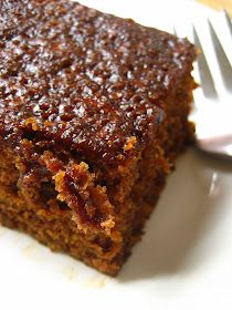 a close up of a piece of cake on a plate with a fork