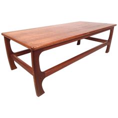 a wooden table sitting on top of a white background