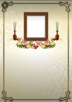 an ornate frame with flowers and candles on the wall next to it is a mirror