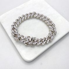 Silver Filled 10mm Iced Miami Cuban Chain Featuring Double Safety Lock Box Cubic Zirconia, Chain or Bracelet, Wholesale Jewelry.- Chain Size:Thickness: 10mm | Clasp Size: 15mmLength: 16 and 18 inches - Bracelet Size:Thickness: 10mm | Clasp Size: 15mmLength: 7 and 8.5 inches Bracelets Silver, Jewelry Chain, Miami Cuban, Cuban Link Chain, Cuban Chain, Cuban Link, Wholesale Jewelry, Chains Jewelry, Bracelet Sizes