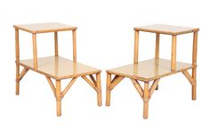 two small wooden tables sitting next to each other