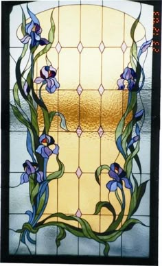 a stained glass window with blue flowers on it