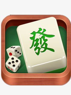 two dices sitting on top of a green table next to a white box with chinese writing