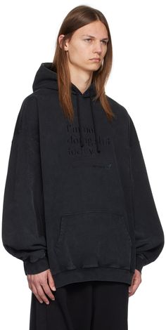 French terry hoodie. · Drawstring and embroidered logo at hood · Text embroidered at front · Kangaroo pocket · Rib knit hem and cuffs · Dropped shoulders · Graphic and text at back Supplier color: Blackout Black Cotton Hoodie With Embroidered Logo, Oversized Hooded Sweatshirt With Embroidered Logo, Oversized Hoodie With Embroidered Logo For Winter, Oversized Winter Hoodie With Embroidered Logo, Relaxed Fit Hoodie With Embroidered Logo For Streetwear, Oversized Cotton Hoodie With Embroidered Logo, Black Hoodie With Embroidered Logo For Winter, Fall Streetwear Hoodie With Embroidered Logo, Winter Hoodie With Embroidered Logo And Relaxed Fit