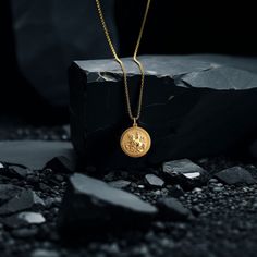 PENDANT INFORMATIONThis pendant is made of real, solid gold.• Made in USA• Size: Mini• Material: 14k or 18k solid gold• Finish: polished• Height: 0.9" (22,5 mm) | *includes the small circle, bail dimensions not included• Width: 0.8" (22 mm)• Pendant weight (approx.): 3 grams (14k)• Bail: fits up to 4 mm chains• Solid back, not hollow• A certificate of authenticity is included• Delivered in our elegant jewelry box, making it the perfect giftPlease note: Our Mini sized pendants are small and delic