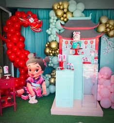 a birthday party with balloons and decorations