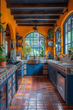 an orange and blue kitchen with tile flooring, potted plants on the window sill