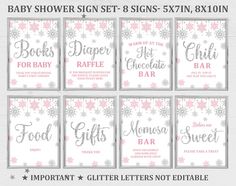 six baby shower signs with pink and silver snowflakes on the front, one for each