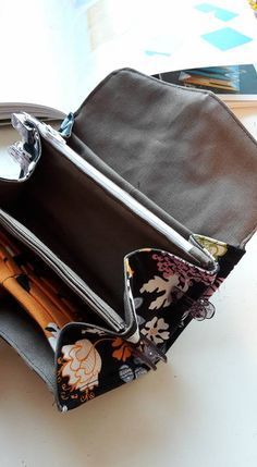 an open purse sitting on top of a table