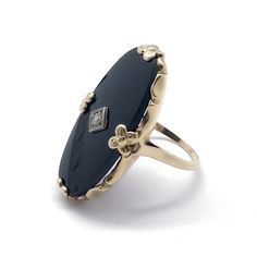 Stunning Vintage Art Deco Piece! Size 6. 10k With Small Diamond In Center. Has Beautiful Gold Flowers At 3:00, 6:00, 9:00 And 12:00. Very Feminine Yet Larger Than Most You See. 30mm X 14mm Approximately. Elegant Black Oval Ring, Elegant Black Rings For Evening, Art Deco Onyx Ring With Black Enamel, Wedding Jewelry With Black Enamel And Onyx, Elegant Black Enamel Rings For Evening, Black Art Deco Gemstone Jewelry, Art Deco Onyx Rings For Formal Occasions, Elegant Round Onyx Rings, Oval Black Enamel Wedding Rings