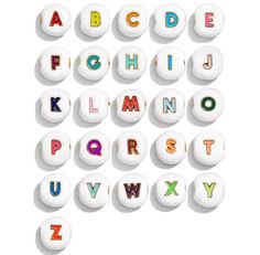 the letters and numbers are made out of white plastic buttons with colorful letters on them