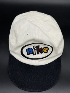 VINTAGE NIKE SPELLOUT Color block Stitched Infant Hat SnapBack Embroidered Cap Nike Sporty Trucker Hat For Sports, Retro Six-panel Sports Hat, Sporty Adjustable Nike Trucker Hat, Nike Sporty Adjustable Trucker Hat, Six-panel Hats With Embroidered Logo For Streetwear, Retro Dad Hat For Outdoor, Vintage Baseball Cap With Embroidered Logo For Sports Events, Nike Six-panel Hat For Sports Events, Retro Adjustable Dad Hat With Embroidered Logo