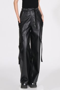 These trousers feature wide legs, pocket flaps, an elastic waistband and adjustable belt, and pockets for convenience.Fabric: Polyester Belted Full-length Bottoms For Fall, Full Length Leather Pants With Pockets, Belted Full-length Pants For Fall, Chic Baggy Cargo Pants For Fall, Utility Wide-leg Pants With Elastic Waistband, Utility Style Wide-leg Pants With Elastic Waistband, Chic Fall Cargo Pants With Multiple Pockets, Chic Black Parachute Pants With Pockets, Black Wide Leg Pants With Belt Loops