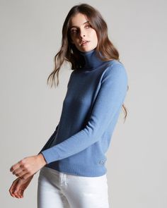 DESCRIPTIONThis turtleneck women's sweater is crafted from plain knitted kid cashmere, an extremely fine and soft fibre, obtained exclusively from the undercoat of Hircus baby goats. The mock turtleneck features a dense micro-ribbed pattern. Its precious and exclusive yarn makes this garment the luxury version of an essential knitwear item.FABRICSThe "kid cashmere" yarn is obtained from the undercoat of Hircus goats kids. The natural molt allows to harvest this precious, exclusive and ultralight