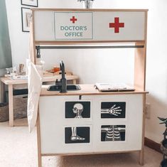 a doctor's office with skeleton drawings on the counter