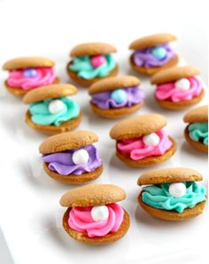 there are many cookies with icing on them