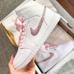 Enhance your look with our Rhinestone Sneakers. Adorned with sparkling Rose Gold-Colored Rhinestones, these sneakers are personalized for you, adding a touch of glamour and comfort to your style. Make a statement and cherish them as a keepsake for years to come.  🎨Artwork: -Exactly as shown in the picture. -Rhinestones are applied. 👟Sneakers: -100 % Authentic Air Jordan Sneakers, purchased at official stores in the US and then customized by our artists. -Mid Tops. 📦What is included: -Artwork. -Sneakers. -White + Satin Laces. -Shipping. 🔙Returns/Exchanges: NO RETURNS. Custom shoes are made to order. If you have any inquiries about your order, please email/message us, and we will be happy to assist you. 🖌️Custom Order: -For custom requests, please send us a message first. -Mock-up is pr Quince Decorations Rose Gold, Quince Shoes Sneakers, Sweet 16 Shoes, Cool Jordans, Wedding Gift For The Bride, Rhinestone Sneakers, Quinceanera Shoes, Custom Air Jordan 1, Casual Shoes Women Sneakers